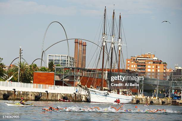 Swimmers compete in the Open Water Swimming Women's 5k race on day one of the 15th FINA World Championships at Moll de la Fusta on July 20, 2013 in...