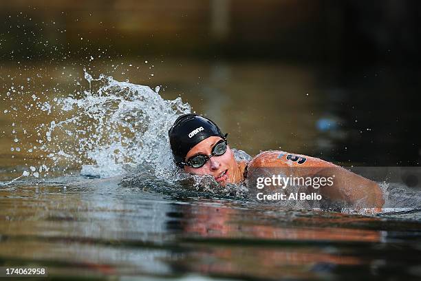 Haley Danita Anderson of USA competes competes in the Open Water Swimming Women's 5k race on day one of the 15th FINA World Championships at Moll de...