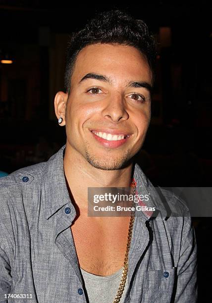 Pop/ R&B Singer/Rapper Dash poses at the "Tio Papi" Photo Call at Planet Hollywood Times Square on July 19, 2013 in New York City.