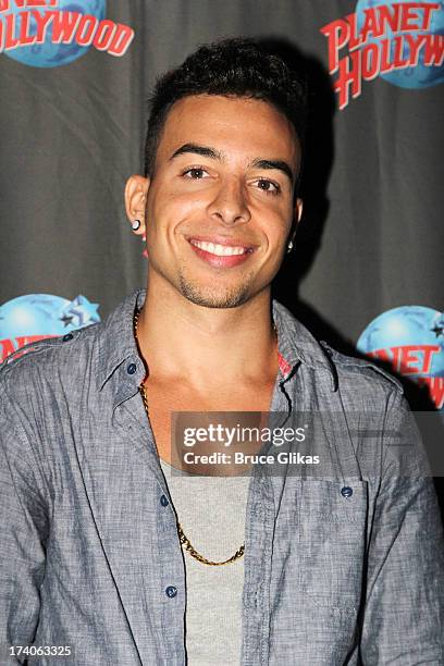 Pop/ R&B Singer/Rapper Dash poses at the "Tio Papi" Photo Call at Planet Hollywood Times Square on July 19, 2013 in New York City.