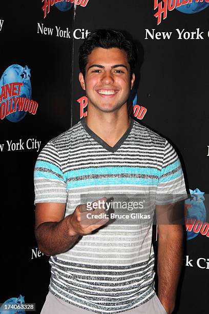 David Castro poses at the "Tio Papi" Photo Call at Planet Hollywood Times Square on July 19, 2013 in New York City.
