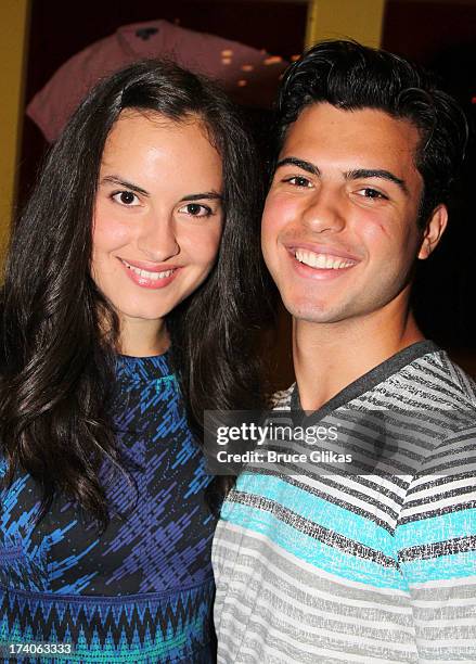 Gabriella Fanuele and David Castro pose at the "Tio Papi" Photo Call at Planet Hollywood Times Square on July 19, 2013 in New York City.