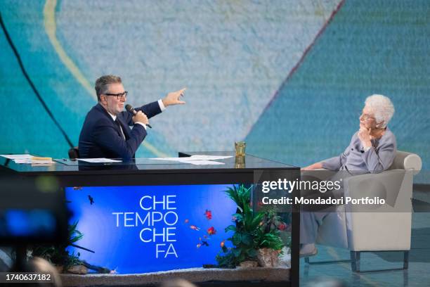 Italian host Fabio Fazio and Italian senator Liliana Segre in the first episode of the television show Che Tempo Che Fa broadcast on Discovery...