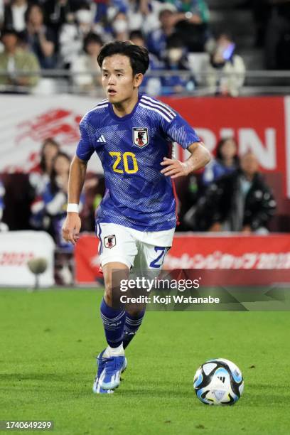 Takefusa Kubo of Japan in action during the international friendly match between Japan and Tunisia at Noevir Stadium Kobe on October 17, 2023 in...