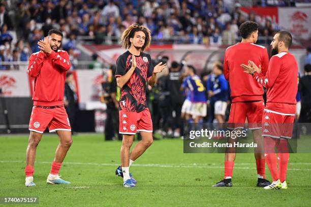 Tunisia players applaud away fans after the team's 0-2 defeat in the international friendly match between Japan and Tunisia at Noevir Stadium Kobe on...