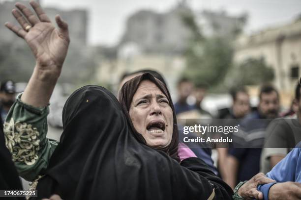 Woman mourns at the morgue of Nasser Hospital, arrived to take the dead bodies of their relatives who lost their lives in Israeli airstrikes in Khan...