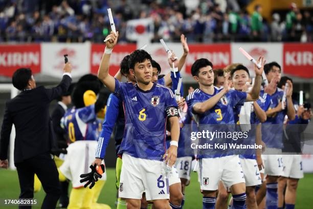 Wataru Endo and Japan players applaud fans after the team's 2-0 victory in international friendly match between Japan and Tunisia at Noevir Stadium...