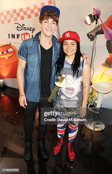 Dan Ferrari-Lane of District 3 and Gabz Gardiner attend an exclusive launch event for upcoming videogame 'Disney Infinity', released nationwide on...