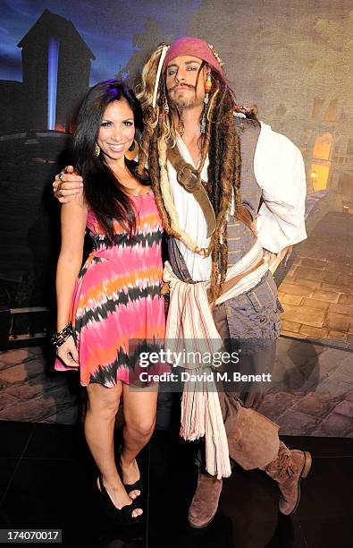 Francine Lewis and Captain Jack Sparrow attend an exclusive launch event for upcoming videogame 'Disney Infinity', released nationwide on August...