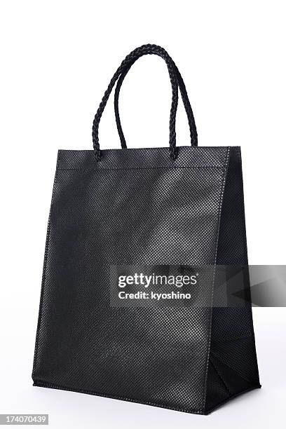 isolated shot of blank black shopping bag on white background - goodie bag stock pictures, royalty-free photos & images