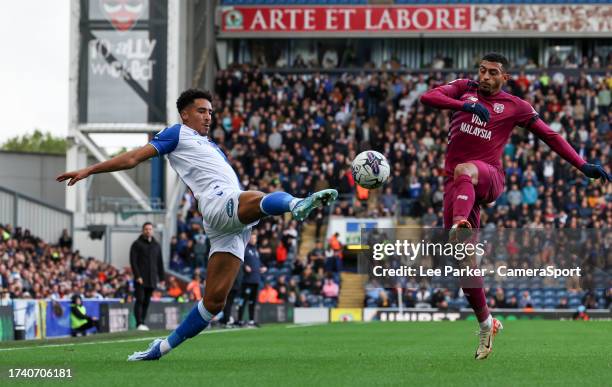 Blackburn Rovers' James Hill stretches to control the ball with Cardiff City's Karlan Grant challenging during the Sky Bet Championship match between...