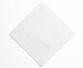 Isolated shot of blank white paper napkin on white background