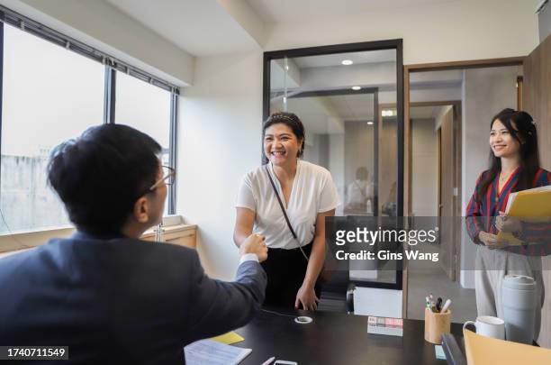 young people who have just graduated from college. freshmen are interviewing in a small office and preparing to work in a new company - interview preparation stock pictures, royalty-free photos & images