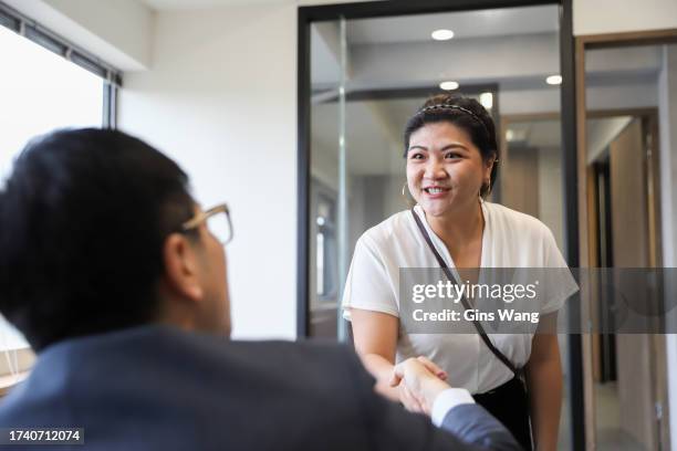 young people who have just graduated from college. freshmen are interviewing in a small office and preparing to work in a new company - job fair stock pictures, royalty-free photos & images