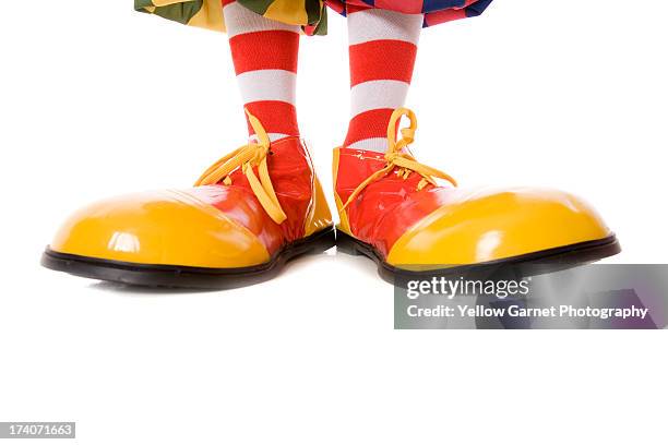 large clown feet in yellow and red shoes - a fool stock pictures, royalty-free photos & images