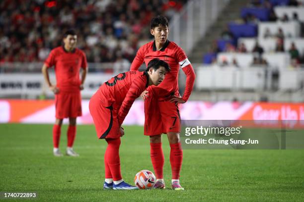 Son Heung-min and Lee Kang-in of South Korea during the international friendly match between South Korea and Vietnam at Suwon World Cup Stadium on...