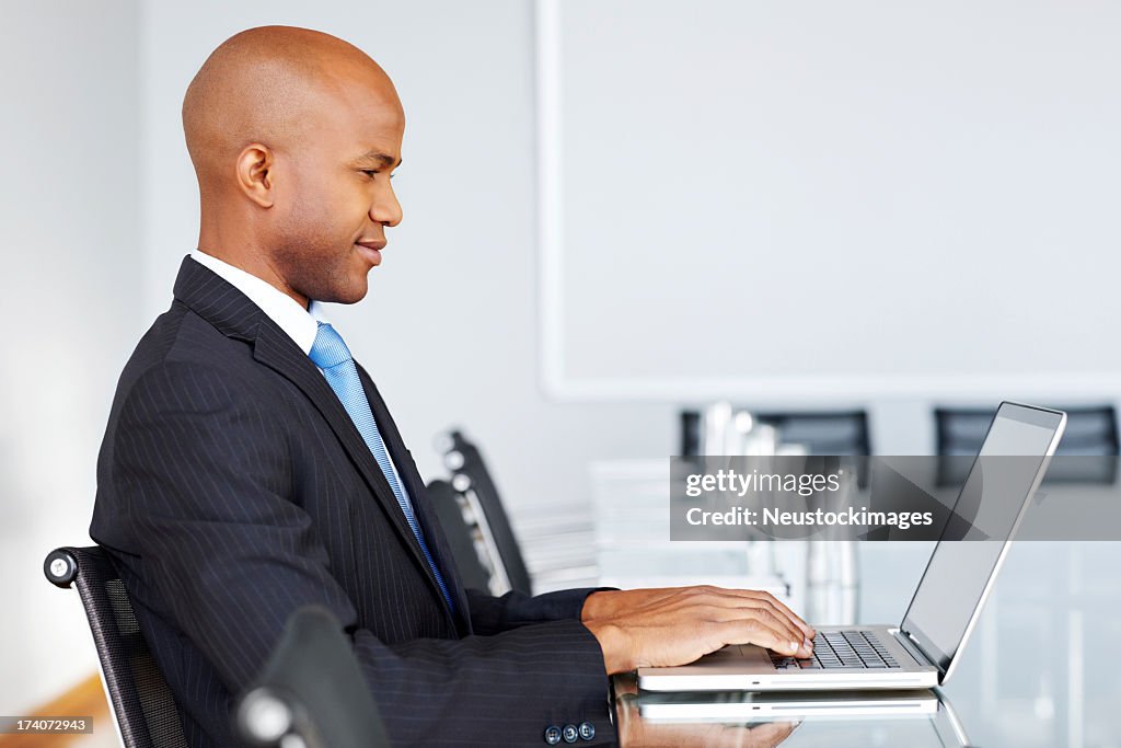 Young Businessman at a Laptop
