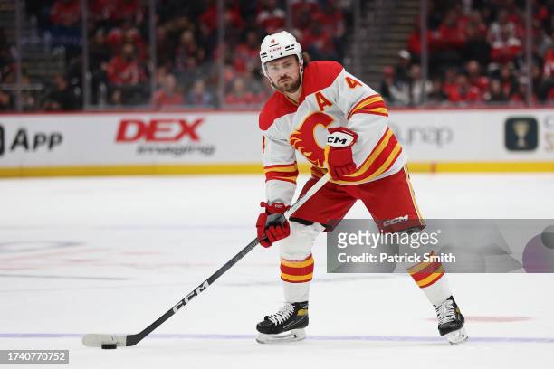 Rasmus Andersson of the Calgary Flames skates against the Washington Capitals at Capital One Arena on October 16, 2023 in Washington, DC.