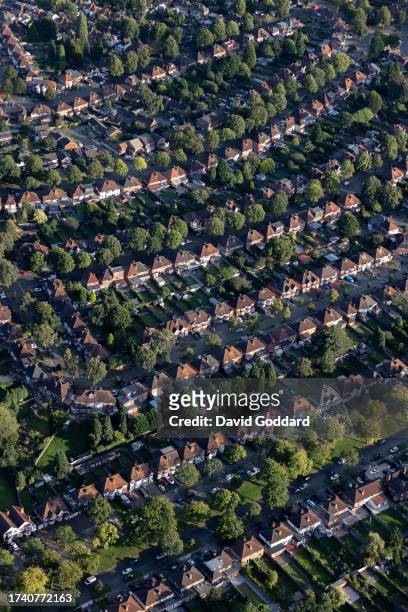 In an aerial view, a collection of semi-detached houses in South Birmingham on August 30 in Birmingham, United Kingdom.