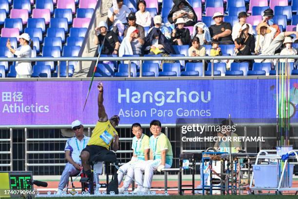 Palestine's Tareq Jalhoom competes in the men's javelin throw F57 final at the Huanglong Sport Centre Stadium during the 2022 Asian Para Games in...