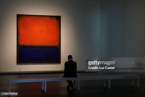 Visitors look at paintings during the Press Preview of the Exhibition Rothko at the Louis Vuitton Foundation in Paris on October 17, 2023 in Paris,...