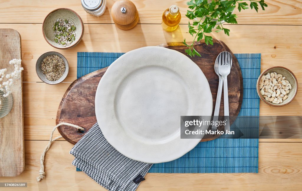 An empty plate on table top background, food preparation