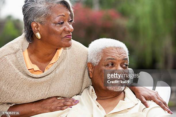 senior african american couple - woman look straight black shirt stock pictures, royalty-free photos & images
