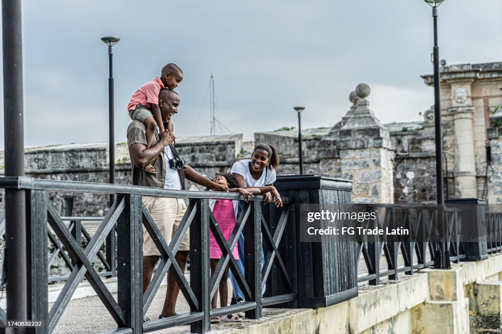 Family talking in bridge outdoor