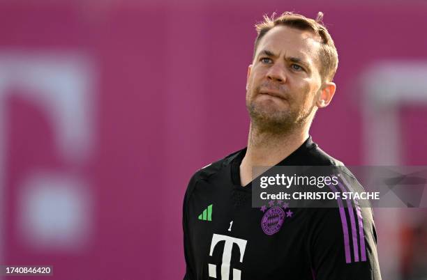 Bayern Munich's German goalkeeper Manuel Neuer reacts during a training session at the team's training ground in Munich, southern Germany, on October...