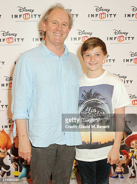 Peter Davison and son Louis attend an exclusive launch event for upcoming videogame 'Disney Infinity', released nationwide on August 23rd, at...