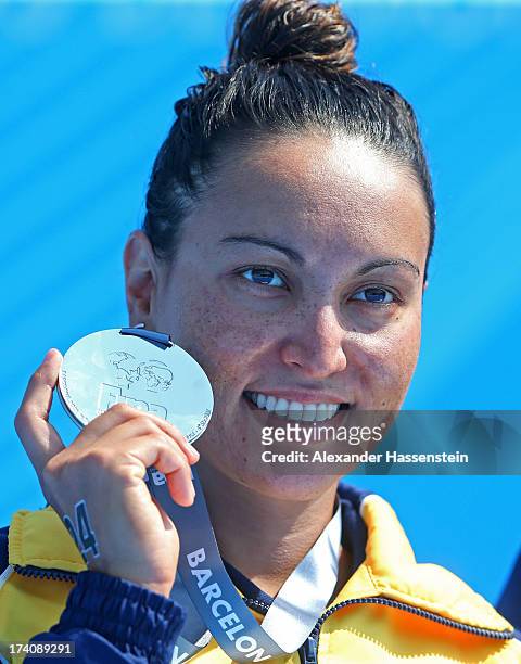 Poliana Okimoto of Brazil poses with her silver medal after the Open Water Swimming Women's 5k race on day one of the 15th FINA World Championships...