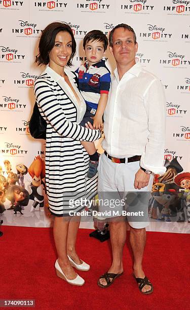 Melissa Porter with son Pierce and guest attend an exclusive launch event for upcoming videogame 'Disney Infinity', released nationwide on August...