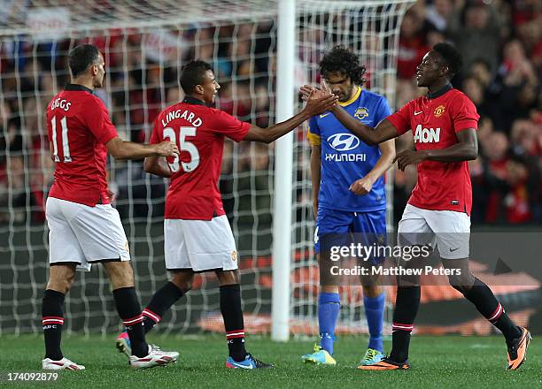 Danny Welbeck of Manchester United celebrates scoring their second goal during the match between the A-League All-Stars and Manchester United at ANZ...