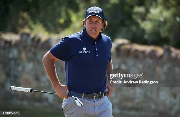 Phil Mickelson of the United States looks on from the 2nd green during the third round of the 142nd Open Championship at Muirfield on July 20, 2013...