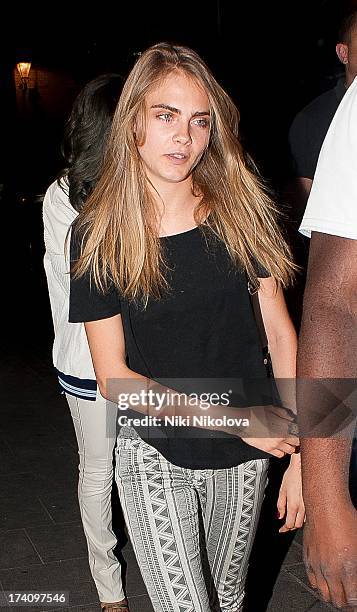 Cara Delevingne seen arriving at Cirque le Soir Club, Soho on July 19, 2013 in London, England.