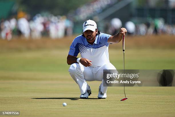 Jason Day of Australia lines up a putt on the 2nd during the third round of the 142nd Open Championship at Muirfield on July 20, 2013 in Gullane,...