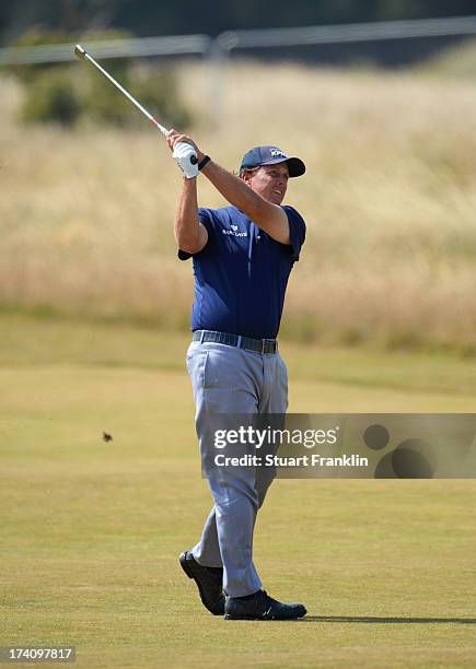 Phil Mickelson of the United States hits on the 5th during the third round of the 142nd Open Championship at Muirfield on July 20, 2013 in Gullane,...