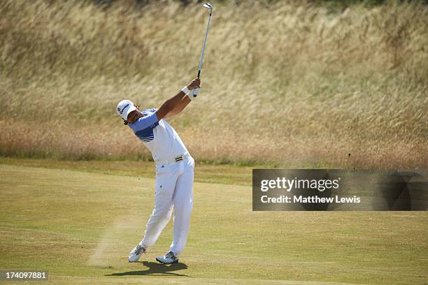 Jason Day of Australia hits a shot from the 2nd fairway during the third round of the 142nd Open Championship at Muirfield on July 20, 2013 in...