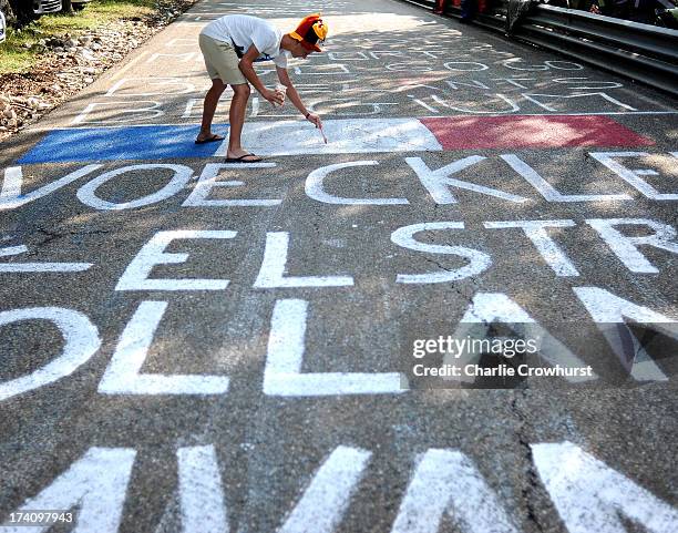 Spectator paints on the road during stage fifteen of the 2013 Tour de France, a 242.5KM road stage from Givors to Mont Ventoux, on July 14, 2013 on...