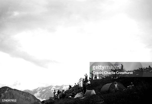 Spectators gather on a hill over looking Dutch corner during stage eighteen of the 2013 Tour de France, a 172.5KM road stage from Gap to l'Alpe...