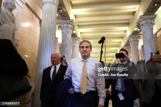 Rep. Jim Jordan walks to the House chambers ahead of today's planned vote for Speaker of the House in the House of Representatives at the U.S....