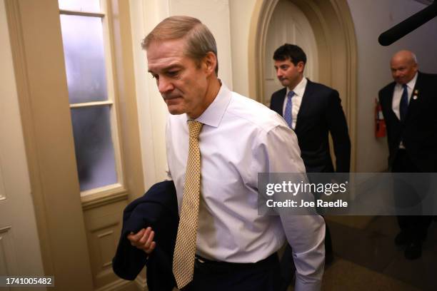 Rep. Jim Jordan walks to the House chambers ahead of today's planned vote for Speaker of the House in the House of Representatives at the U.S....