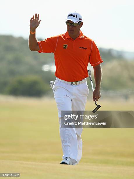 Lee Westwood of England reacts after making an eagle putt on the 5th hole during the third round of the 142nd Open Championship at Muirfield on July...