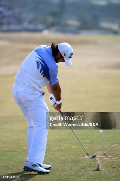 Jason Day of Australia hits his tee shot on the 12th hole during the third round of the 142nd Open Championship at Muirfield on July 20, 2013 in...