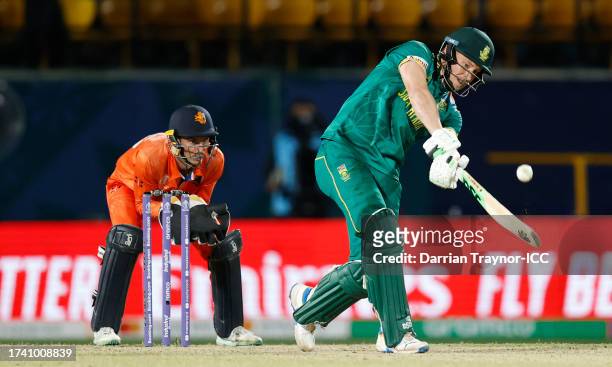 David Miller of South Africa plays a shot as Scott Edwards of Netherlands keeps during the ICC Men's Cricket World Cup India 2023 between South...
