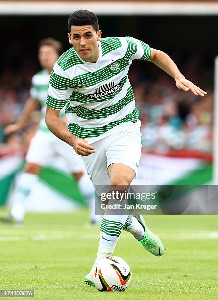 Tom Rogic of Celtic in action during a pre season friendly match between Brentford and Celtic at Griffin Park on July 20, 2013 in Brentford, England.