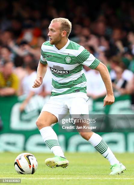 Dylan McGeouch of Celtic controls the ball during a pre season friendly match between Brentford and Celtic at Griffin Park on July 20, 2013 in...