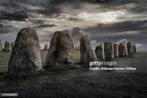 panoramic view of rocks on field against sky - iron age stock pictures, royalty-free photos & images