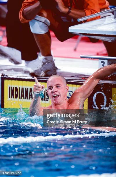 Erik Vendt of of USA celebrates winning the 1500m freestyle final during the U.S Olympic Swimming Trials at the Indiana University Natatorium on...