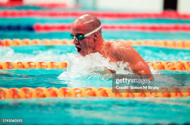 Erik Vendt of of USA in action during the Men's 400m Individual Medley heat during the Olympics at the Sydney International Aquatic Centre on...